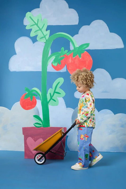 Image of a model wearing Tops. Productname: Farming Kids LS Tee in Cream colour by brand - Gorman