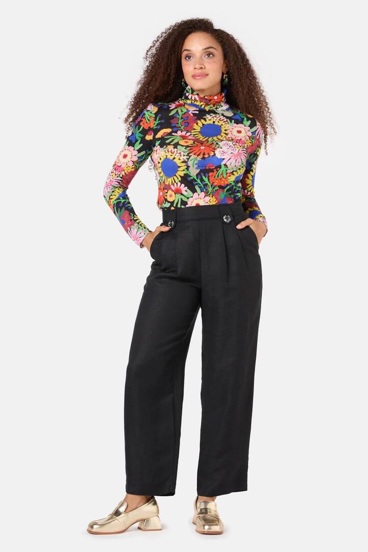 Image of a model wearing Pants. Product name - Zola Pant in Black colour by brand - Gorman