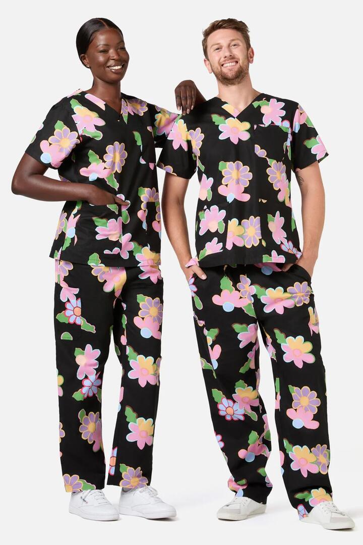 Image of a model wearing Uniforms & Workwear. Productname: Floral Pop Scrub Set in Black colour by brand - Gorman
