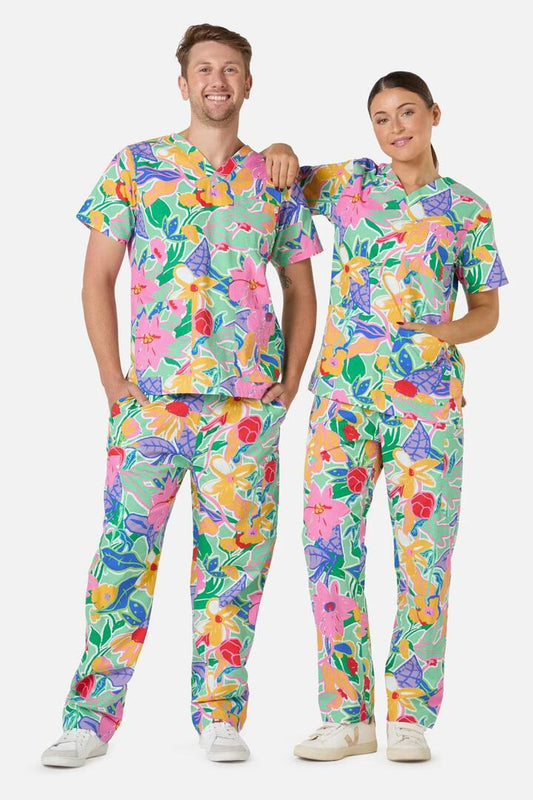 Image of a model wearing Uniforms & Workwear. Product name - Floweret Scrub Set in Green colour by brand - Gorman