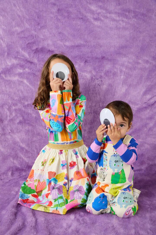 Image of a model wearing Skirts. Productname: Wild Flowers Kids Skirt in Cream colour by brand - Gorman