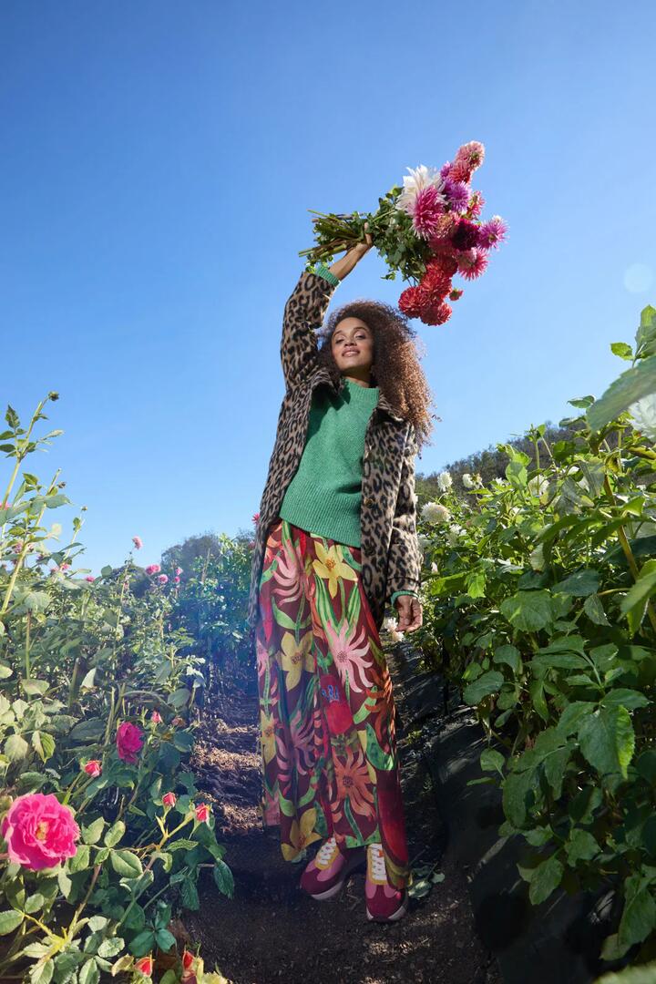 Image of a model wearing Skirts. Product name - Rosie's Posies Culotte in Print colour by brand - Gorman