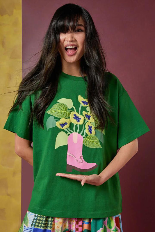 Image of a model wearing Tops. Productname: Windowsill Placement Oversized Tee in Green colour by brand - Gorman