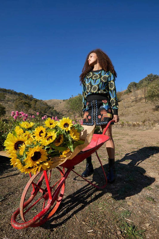 Image of a model wearing Skirts. Product name - The Horses Mini Skirt in Black colour by brand - Gorman