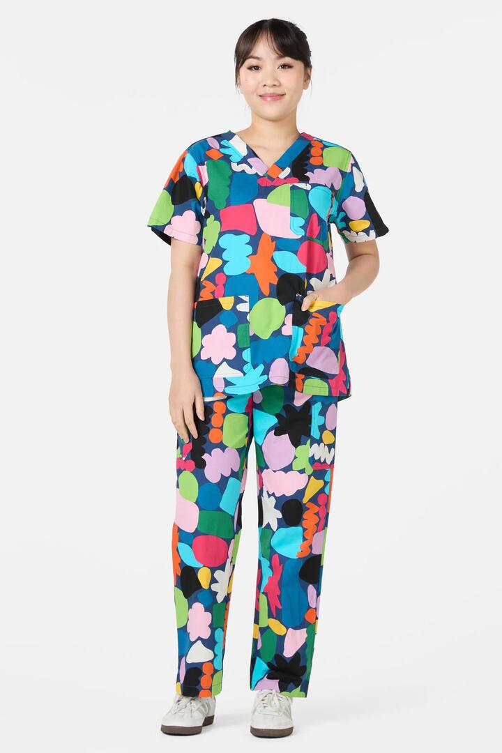 Image of a model wearing Uniforms & Workwear. Product name - Puzzle Scrub Set in Navy colour by brand - Gorman