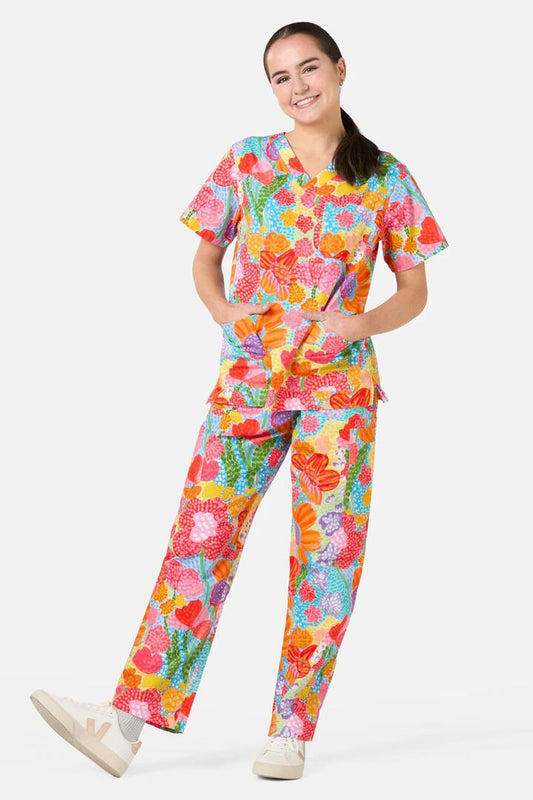 Image of a model wearing Uniforms & Workwear. Product name - Spotted Flower Scrub Set in Multi colour by brand - Gorman