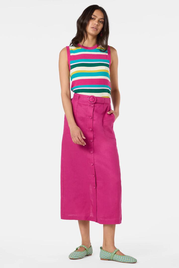 Image of a model wearing Skirts. Product name - Dahlia Midi Skirt in Raspberry colour by brand - Gorman