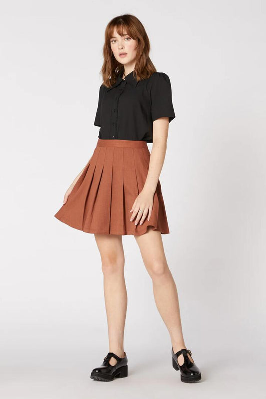 Image of a model wearing Skirts. Productname: Briony Skirt in Mocha colour by brand - Princess Highway