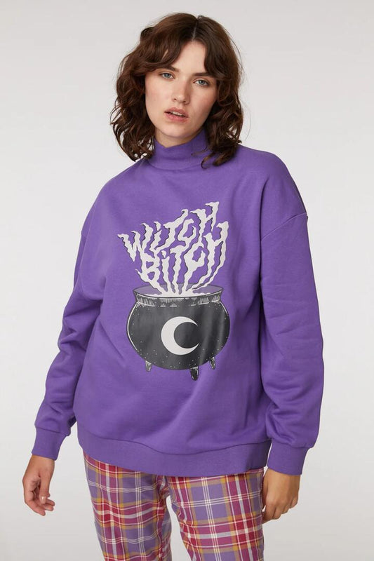 Image of a model wearing Outerwear. Productname: Witch Bitch Sweater in Purple colour by brand - Black Friday