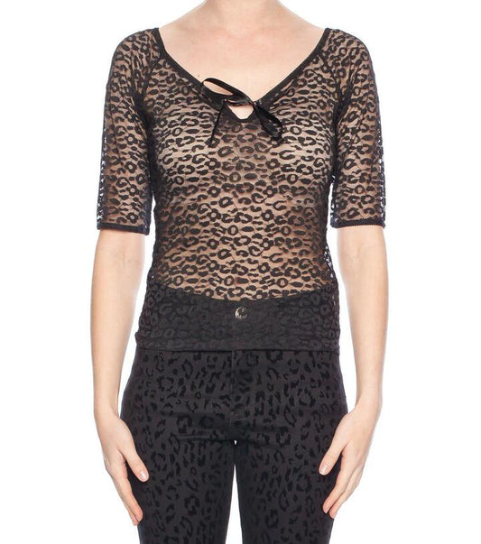 Image of a model wearing Tops. Productname: Carolina Lace Top in White colour by brand - Revival