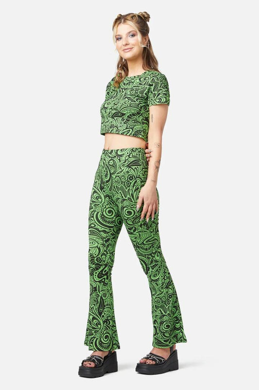 Image of a model wearing Tops. Productname: Acid Paisley Jersey Crop Tee in Green/Black colour by brand - Dangerfield