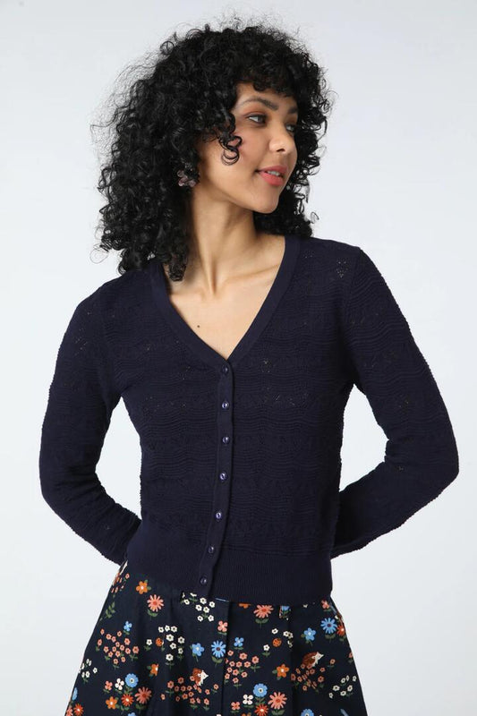 Image of a model wearing Outerwear. Productname: Colette Cardi in Navy colour by brand - Princess Highway