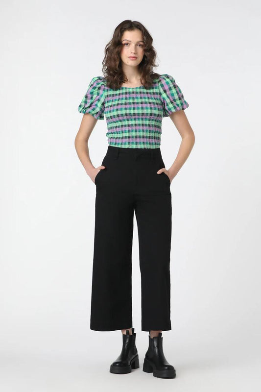 Image of a model wearing Pants. Productname: Sienna Pant in Navy colour by brand - Princess Highway