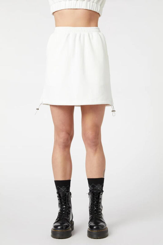 Image of a model wearing Outerwear. Productname: On Fleece Skirt in White colour by brand - Dangerfield