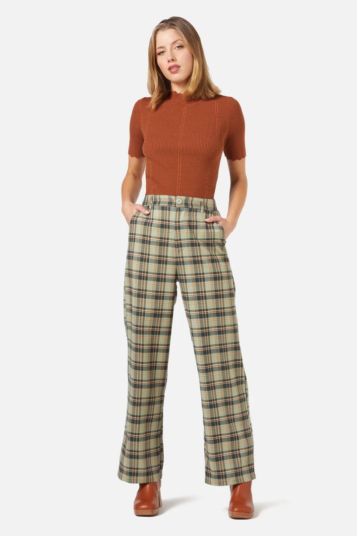 Image of a model wearing Pants. Productname: Jeannie Check Pant in Green colour by brand - Princess Highway