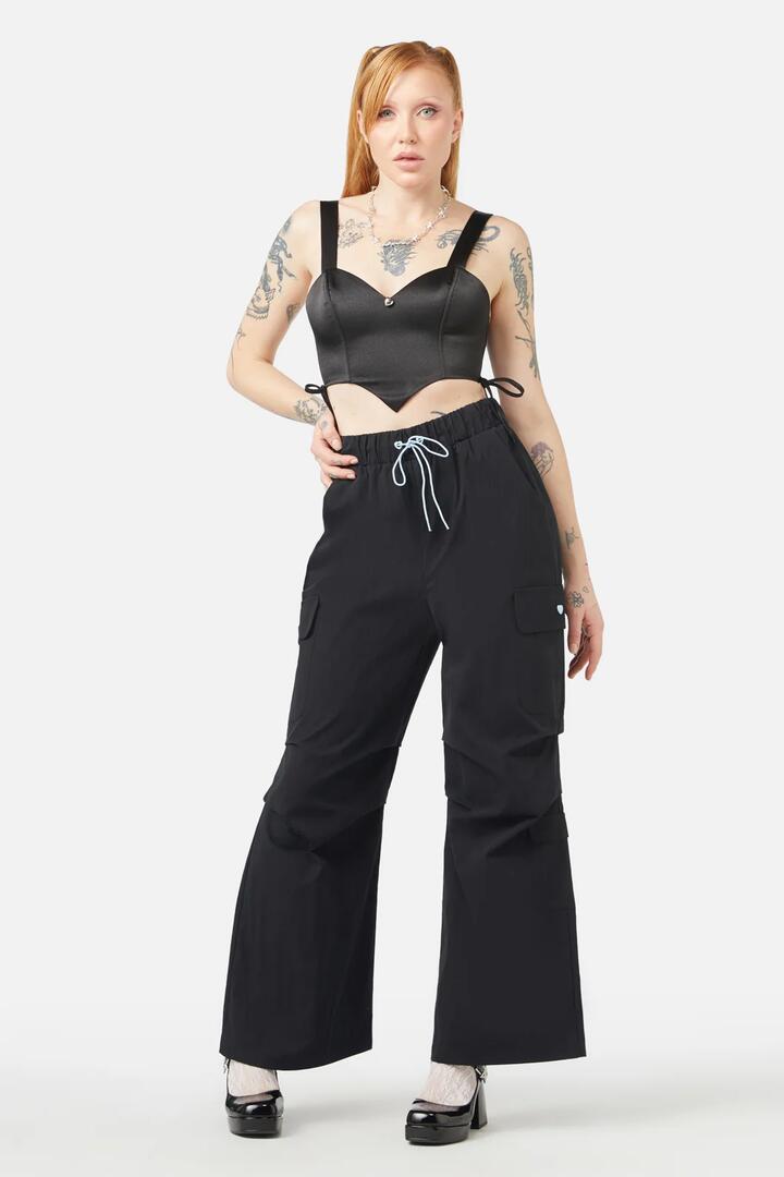 Image of a model wearing Pants. Productname: Slumber Cargo Pant in Pink colour by brand - Dangerfield