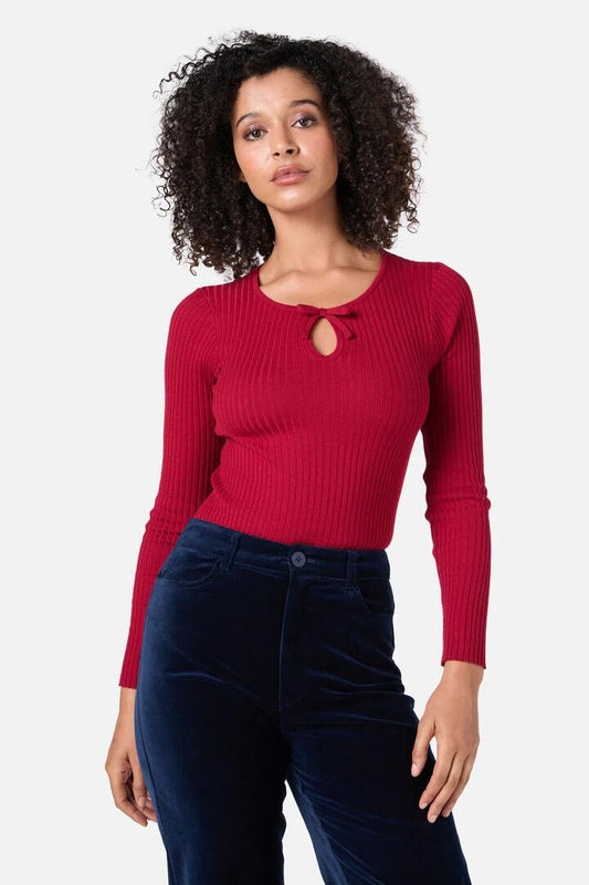 Image of a model wearing Tops. Productname: Anna Bow Knit Top in Red colour by brand - Princess Highway