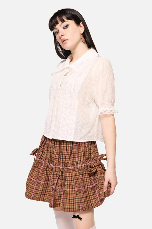 Image of a model wearing Tops. Productname: Friendly Cow Broderie Blouse in White colour by brand - Dangerfield