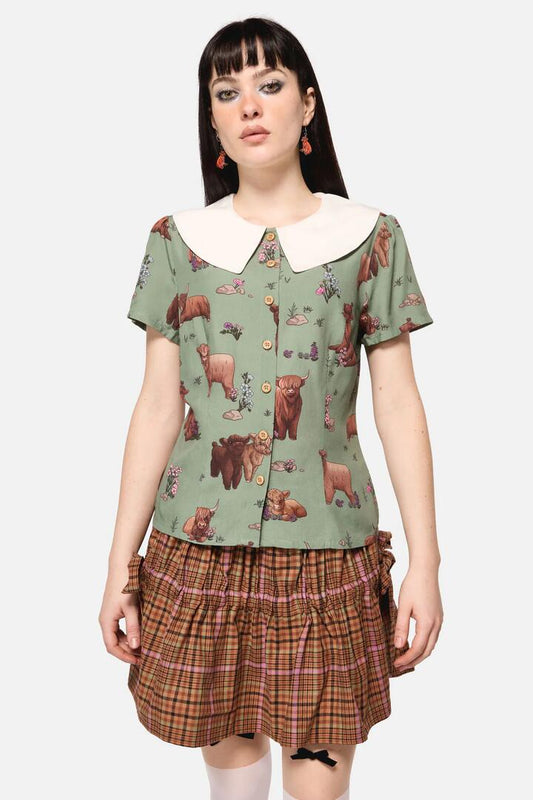 Image of a model wearing Tops. Productname: Highland Fling Blouse in Green colour by brand - Dangerfield