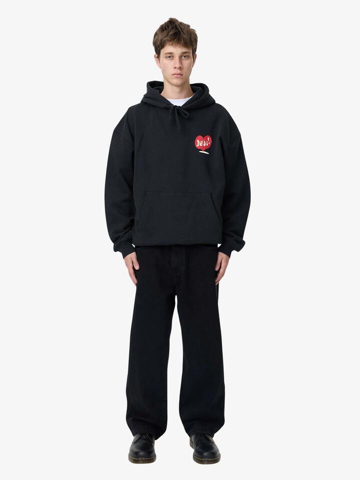 Image of a model wearing Outerwear. Productname: Deus Deep Cut Hoodie in Black colour by brand - Deus