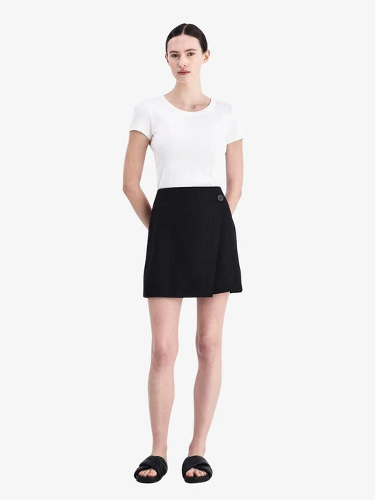 Image of a model wearing Skirts. Productname: Nude Lucy Thilda Linen Skirt in Black colour by brand - Nude Lucy