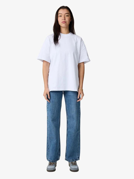 Image of a model wearing Tops. Productname: Lulu & Rose Bloom Oversized Tee in Off White colour by brand - Lulu & Rose