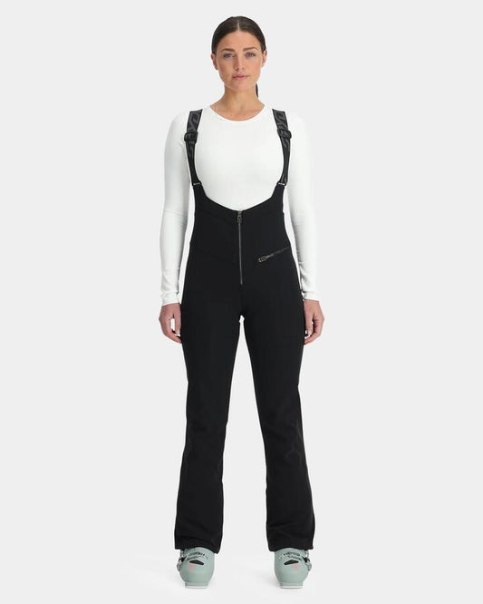 Image of a model wearing Pants. Productname: Spyder - Womens Strutt Bib Softshell Snow Pants - Black - in Black colour by brand - Spyder