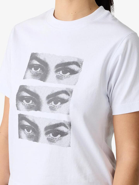 Image of a model wearing Tops. Productname: MSE Eyes Open Baby Tee in Off White colour by brand - MSE
