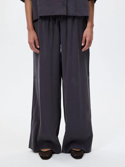 Image of a model wearing Pants. Productname: Lulu & Rose Tulli Drawstring Pant in Slate colour by brand - Lulu & Rose