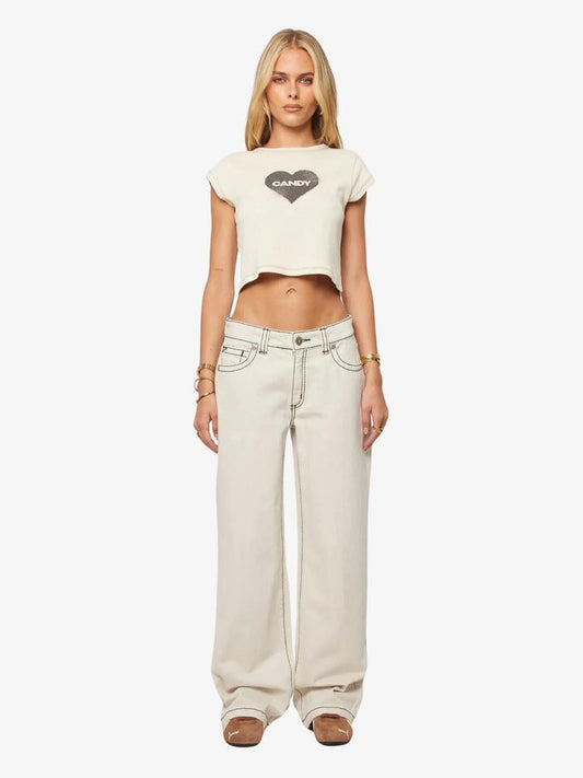 Image of a model wearing Tops. Productname: Abrand Rebellion Cropped Tee in Dirty White colour by brand - Abrand