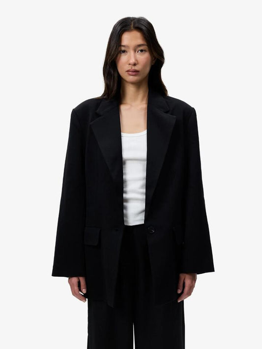 Image of a model wearing Outerwear. Productname: Lulu & Rose Saskia Oversized Blazer in Black colour by brand - Lulu & Rose