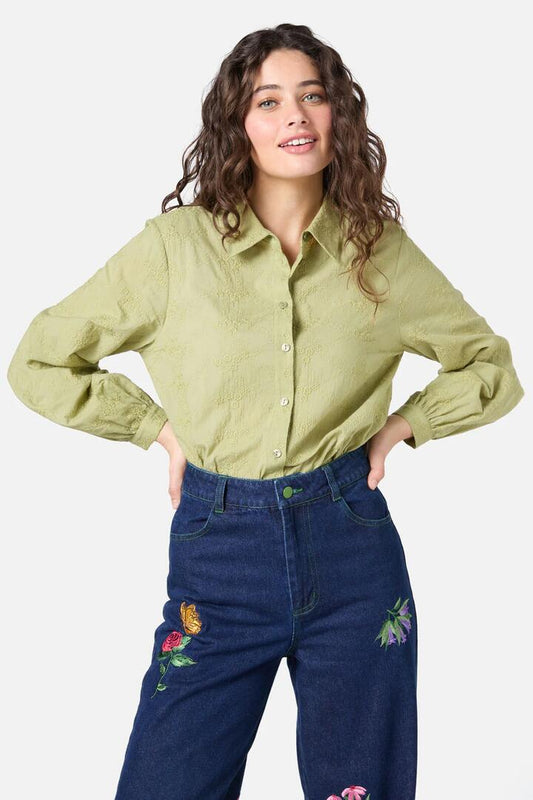 Image of a model wearing Tops. Productname: Ada Embroidered Flower Shirt in Olive colour by brand - Princess Highway