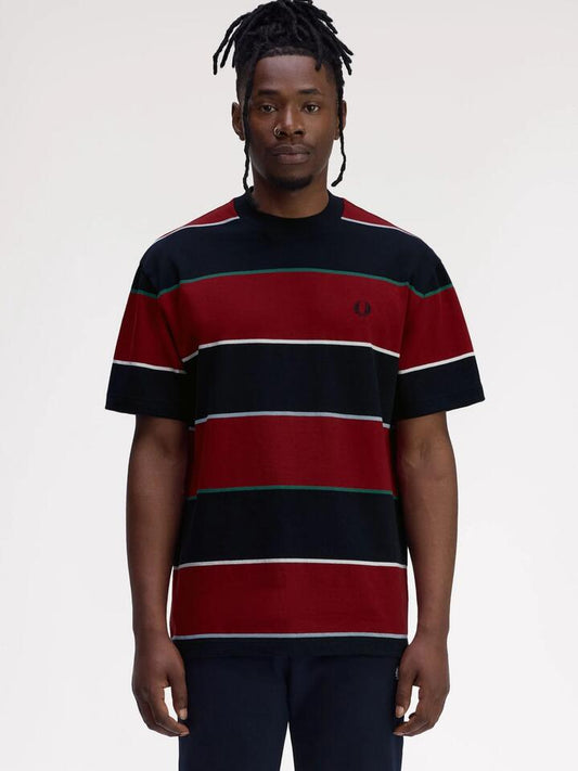 Image of a model wearing Tops. Productname: Fred Perry Striped Relaxed T-Shirt in Navy colour by brand - Fred Perry