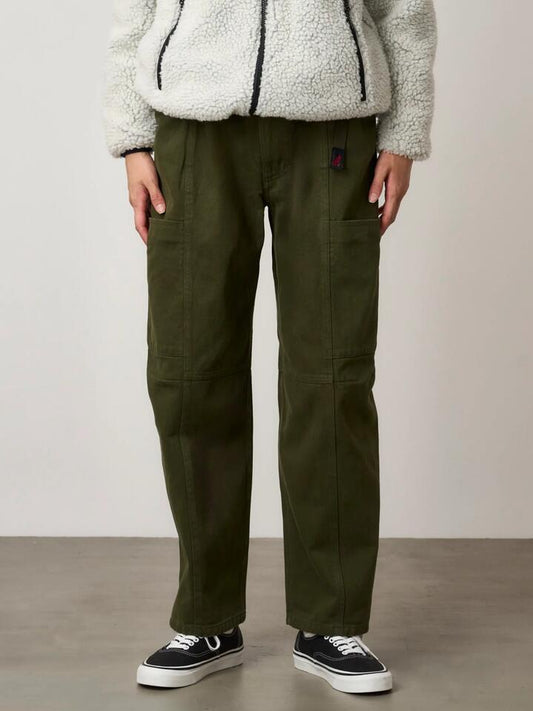 Image of a model wearing Pants. Productname: Gramicci Women's Winter Twill Voyager Pants in Deep Olive colour by brand - Gramicci