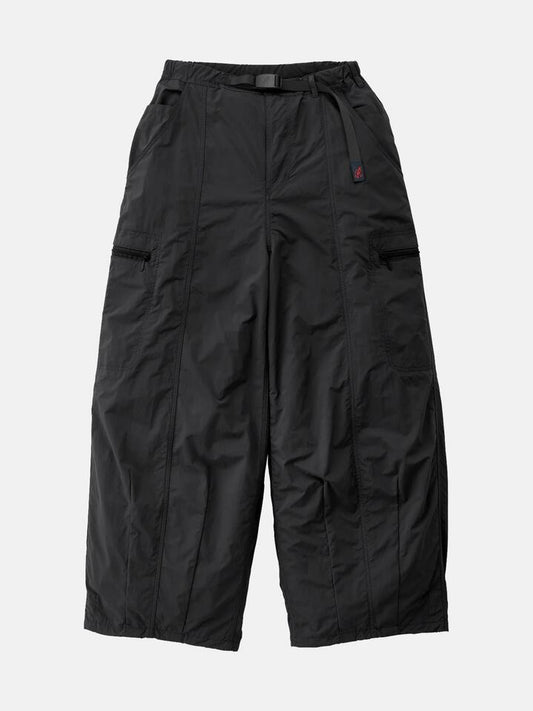 Image of a model wearing Pants. Productname: Gramicci Women's Nylon Balloon Pants in Black colour by brand - Gramicci