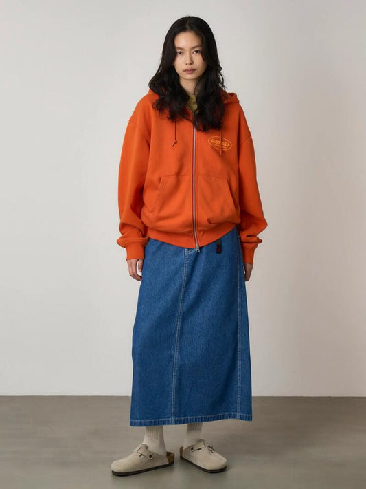 Image of a model wearing Outerwear. Productname: Gramicci Women's Original Freedom Hooded Sweatshirt in BURNT ORANGE colour by brand - Gramicci