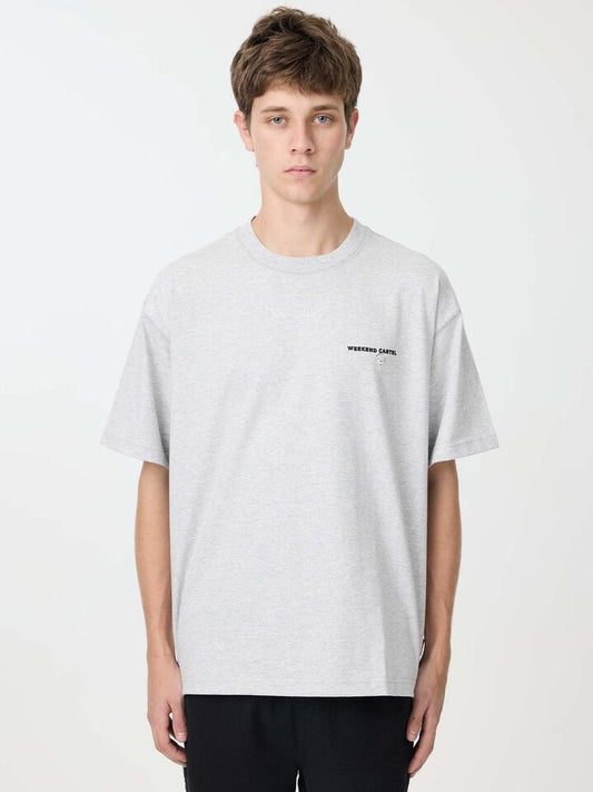 Image of a model wearing Tops. Productname: Weekend Cartel History Tee in Ash Marle colour by brand - Weekend Cartel
