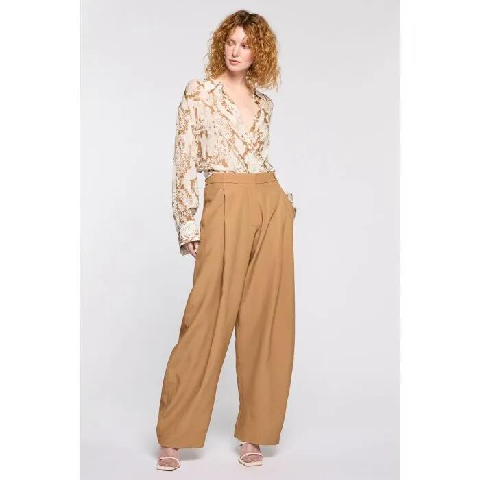 Image of a model wearing Pants. Productname: Ivy Dance Pant in TOFFEE colour by brand - sass and bide