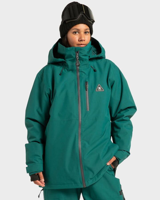 Image of a model wearing Outerwear. Productname: DC Shoes - Mens Basis 30K Shell Jacket - Deep Teal - in Deep Teal colour by brand - DC Shoes