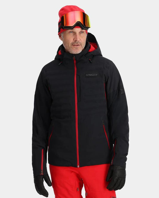 Image of a model wearing Outerwear. Productname: Spyder - Mens Pinacle Snow Jacket - Black - in Black colour by brand - Spyder