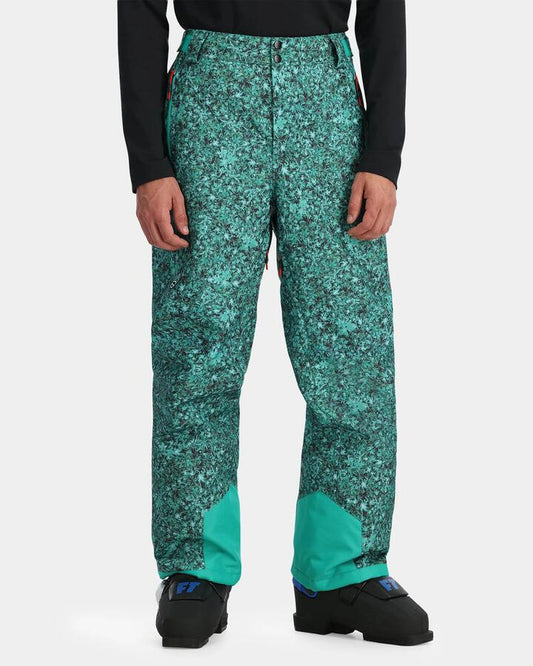 Image of a model wearing Pants. Productname: Spyder Mens Seventy Snow Pants Maple Haze Teal Gree - in Maple Haze Teal Gree colour by brand - Spyder