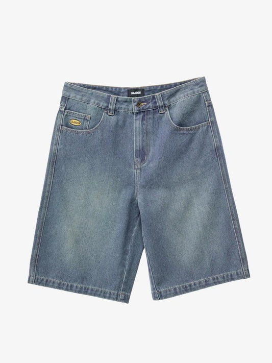 Image of a model wearing Denim. Productname: Xlarge Baggy Bull Denim 91 Shorts in Faded Blue colour by brand - Xlarge