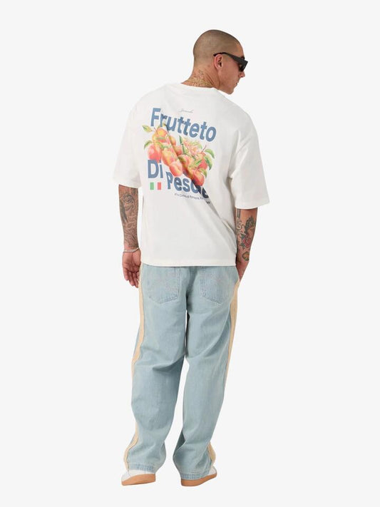 Image of a model wearing Tops. Productname: Zanerobe Pesche Flow Tee in Vintage White colour by brand - Zanerobe