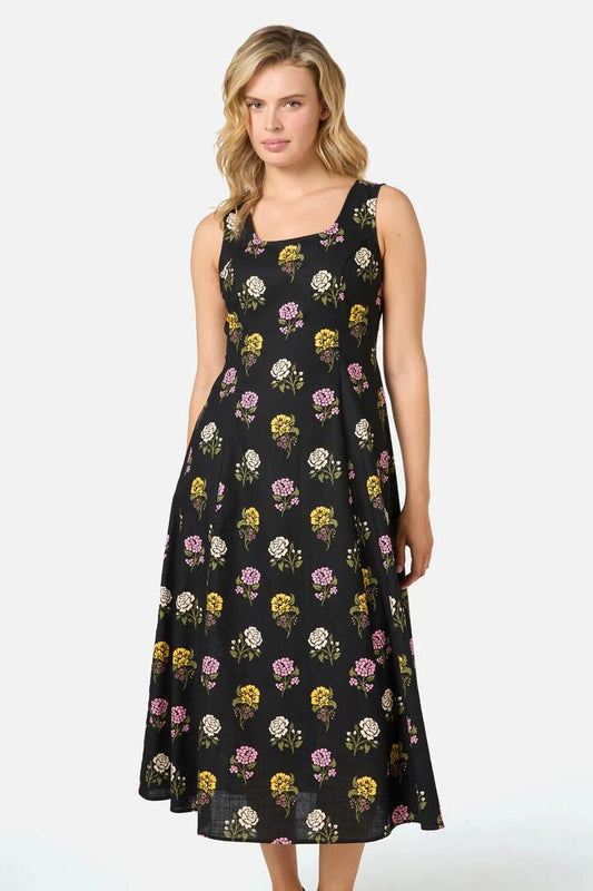 Image of a model wearing Dress. Productname: Astrid Rose Midi Dress in Black colour by brand - Princess Highway