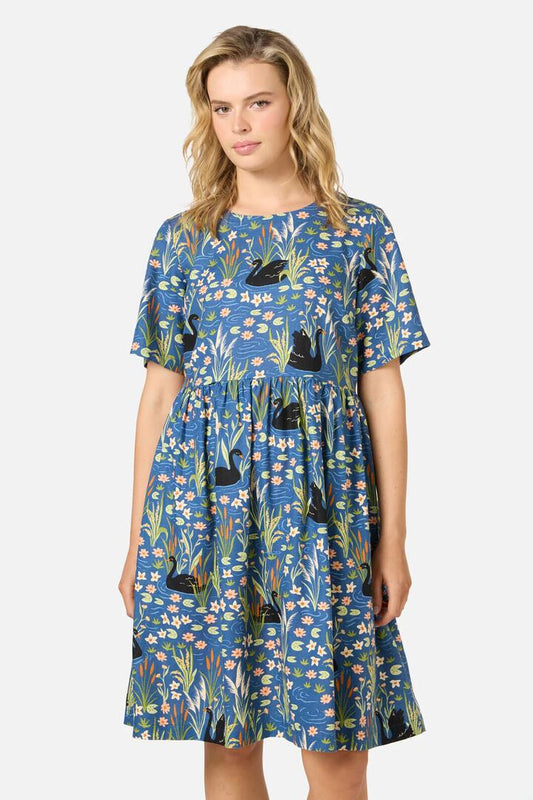 Image of a model wearing Dress. Productname: Pretty Swan Smock Dress in Navy colour by brand - Princess Highway