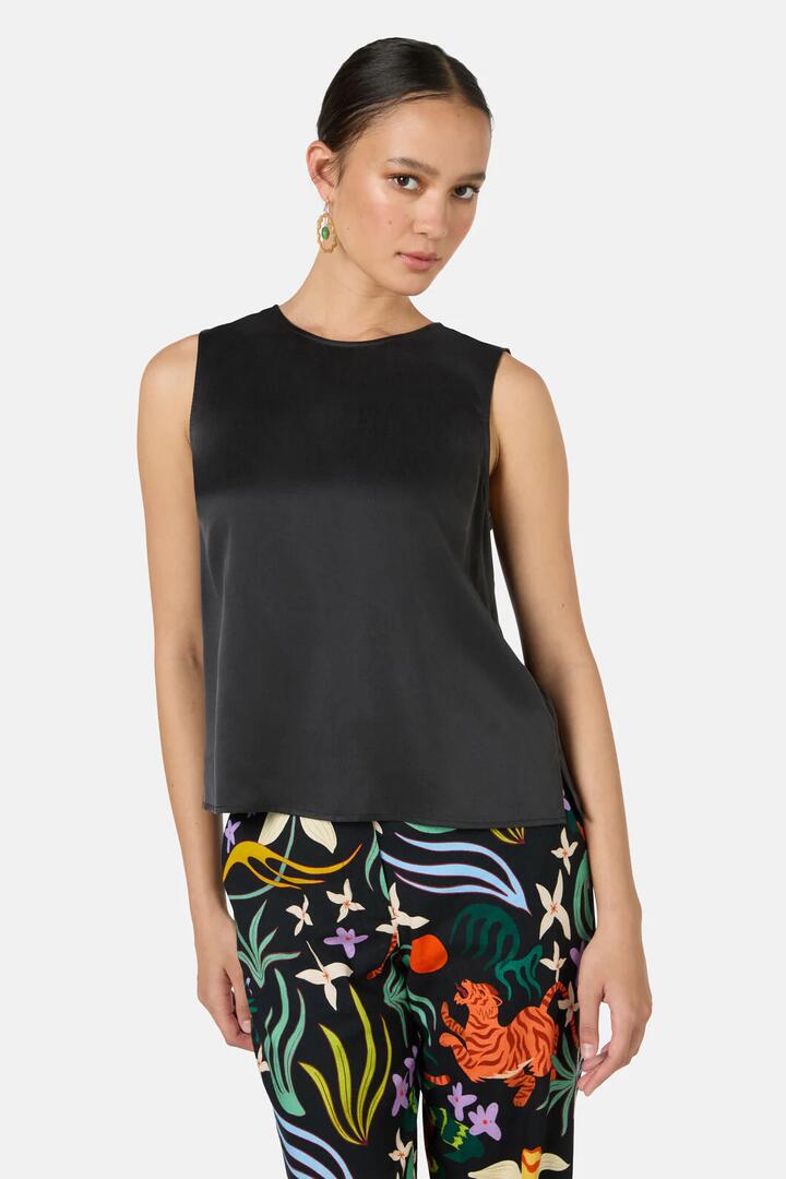 Image of a model wearing Tops. Product name - Anika Sandwashed Silk Tank in Blue colour by brand - Gorman
