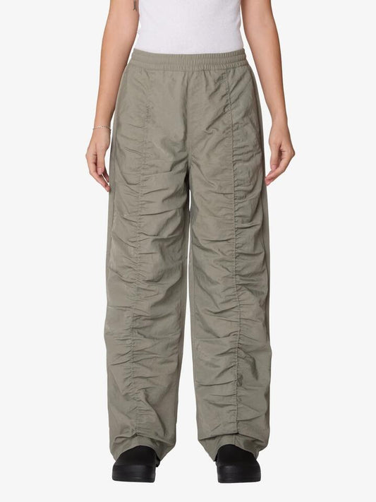 Image of a model wearing Pants. Productname: Obey Lula Flight Pants in Sage colour by brand - Obey
