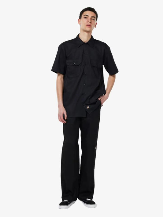 Image of a model wearing Pants. Productname: Dickies Double Knee Pants in Black colour by brand - Dickies