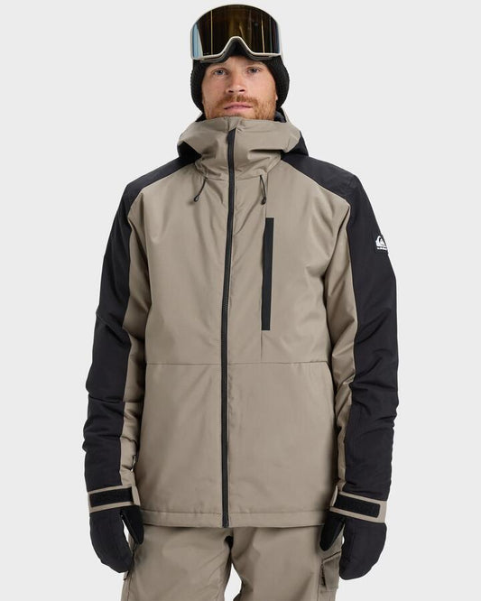 Image of a model wearing Outerwear. Productname: Quiksilver - Mens Mission Block Snow Jacket - Fallen Rock - in Fallen Rock colour by brand - Quiksilver