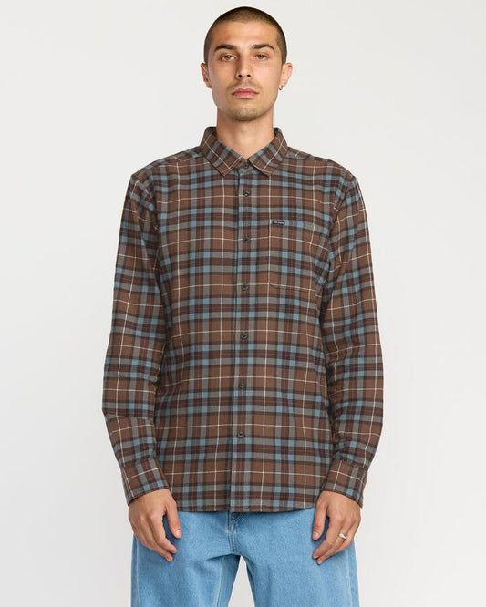 Image of a model wearing Tops. Productname: Volcom - Mens Caden Plaid Long Sleeve Shirt - Brown Stone - in Brown Stone colour by brand - Volcom